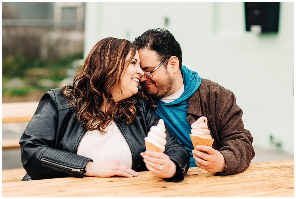 Sharing soft-serve ice cream at Soft Landing to end their engagement session in Boise.